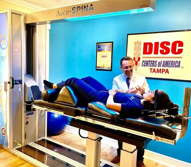 Dr. Gomez and patient after successful IDD Therapy treatment for disc pain and spinal decompression